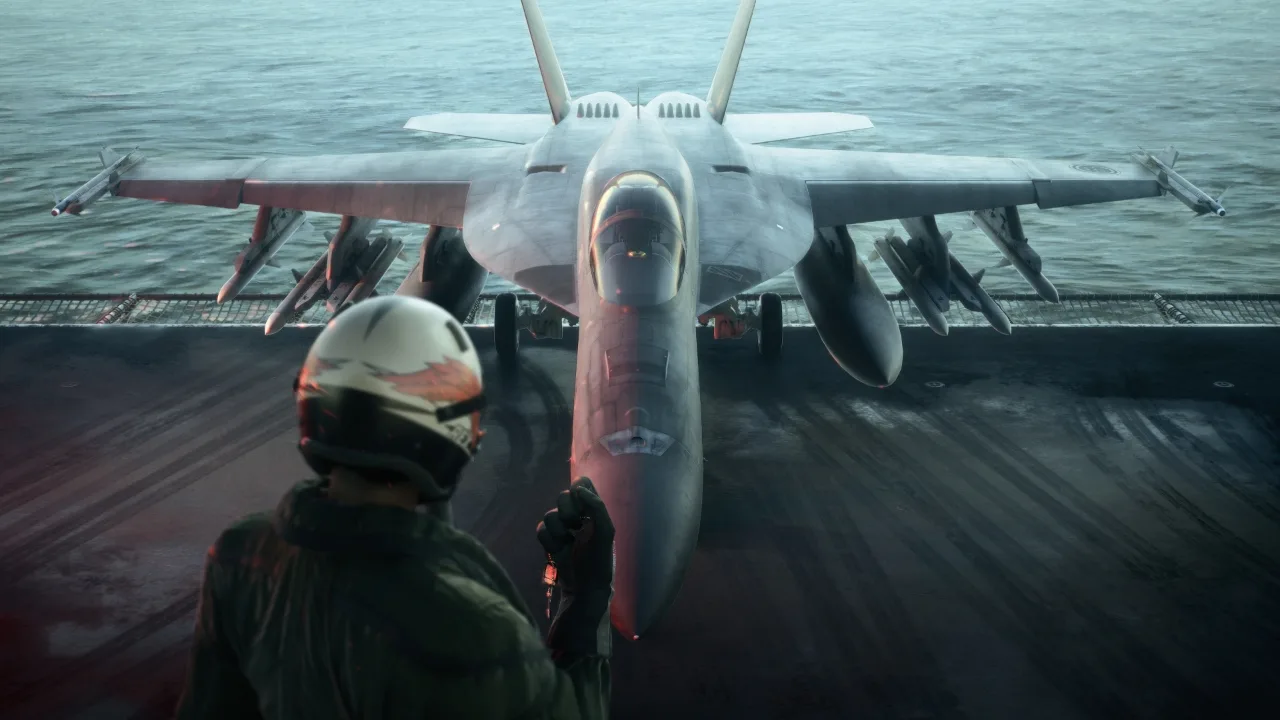 Pilot facing a fighter on the carrier deck